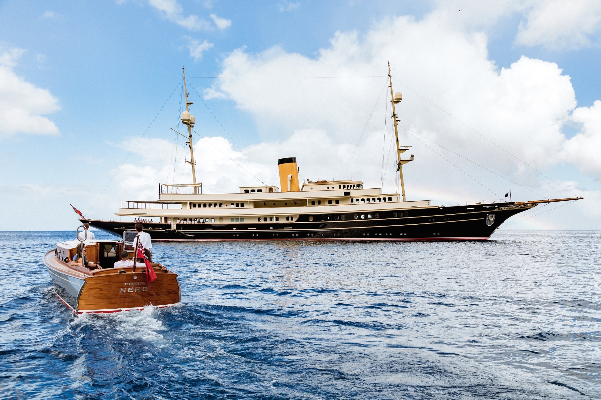 Luxury motor yacht cruising along the French Riviera coast