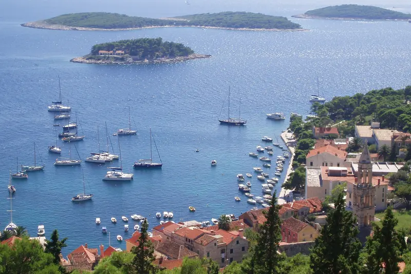 Yachts anchored off Hvar town with the Pakleni Islands beyond, Croatia
