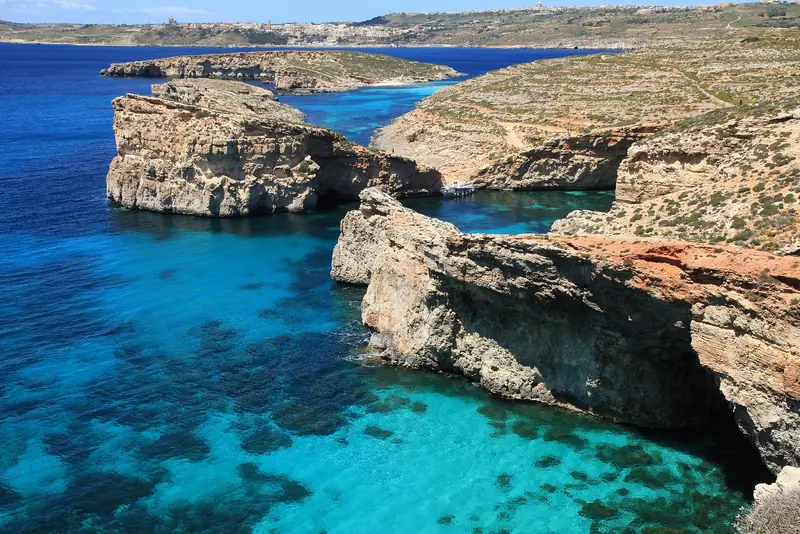Cliffs and turquoise water at the Blue Lagoon, Comino, Malta